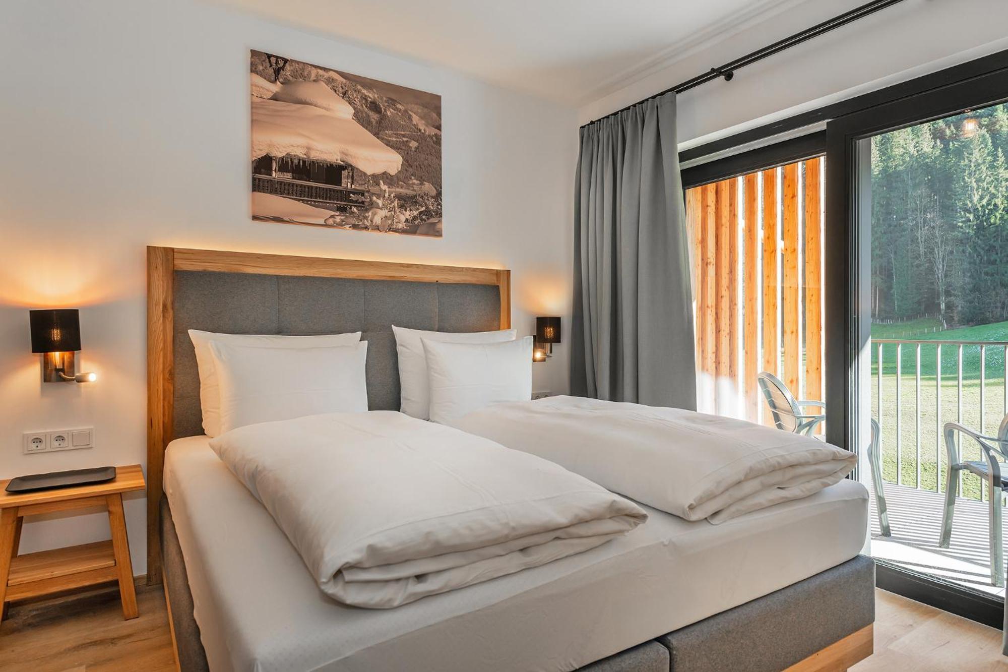 Alpenparks Hotel & Apartment Taxacher Кирхберг Экстерьер фото
