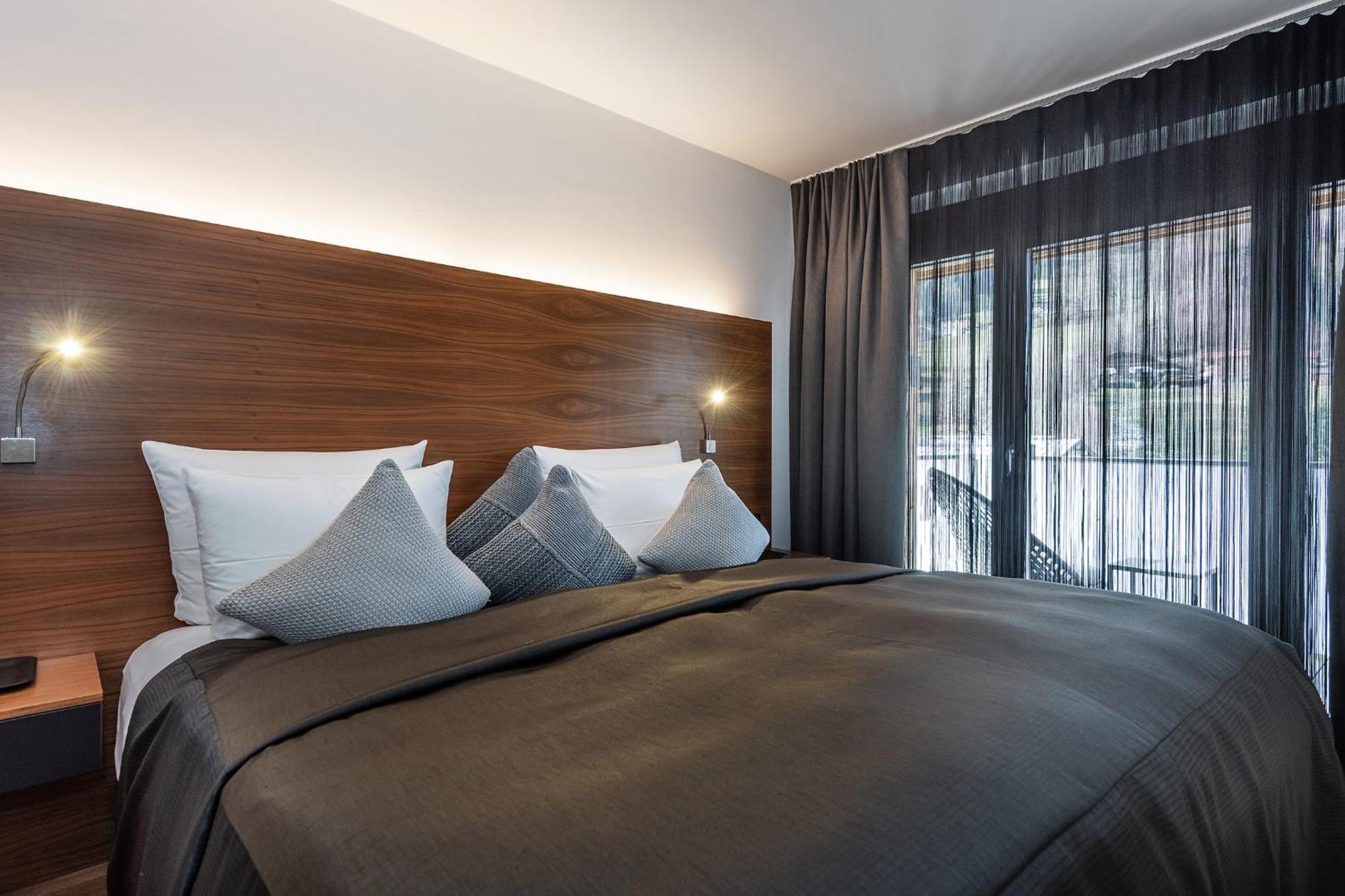 Alpenparks Hotel & Apartment Taxacher Кирхберг Экстерьер фото