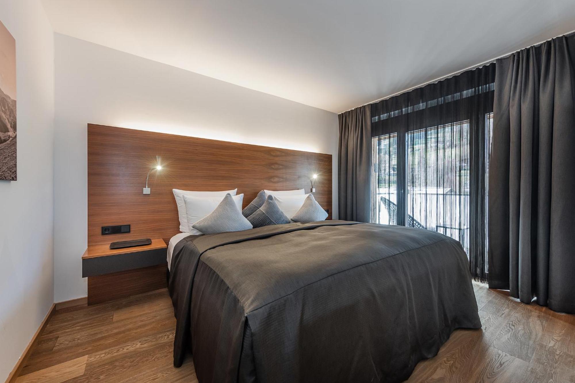 Alpenparks Hotel & Apartment Taxacher Кирхберг Экстерьер фото