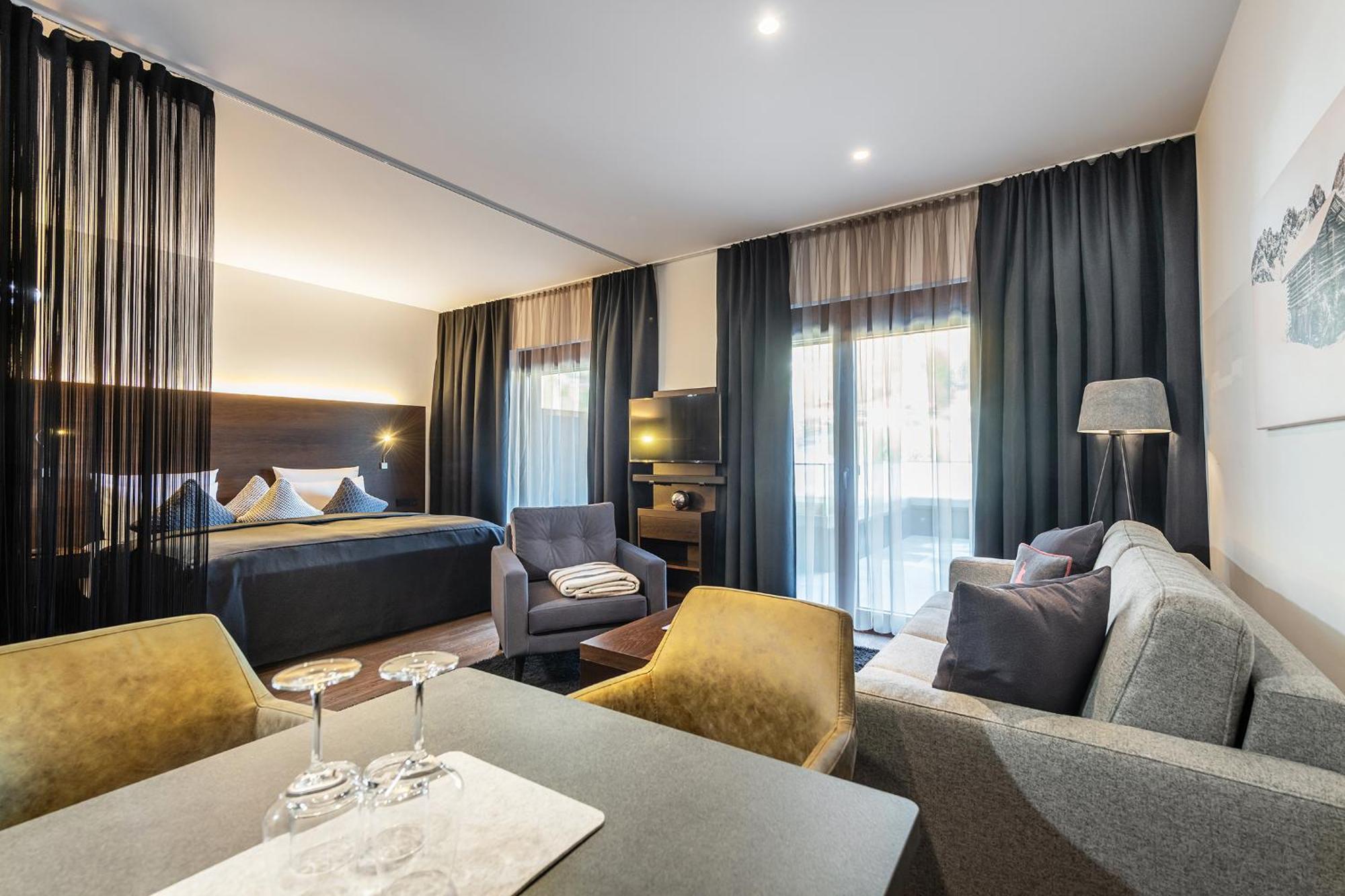 Alpenparks Hotel & Apartment Taxacher Кирхберг Экстерьер фото