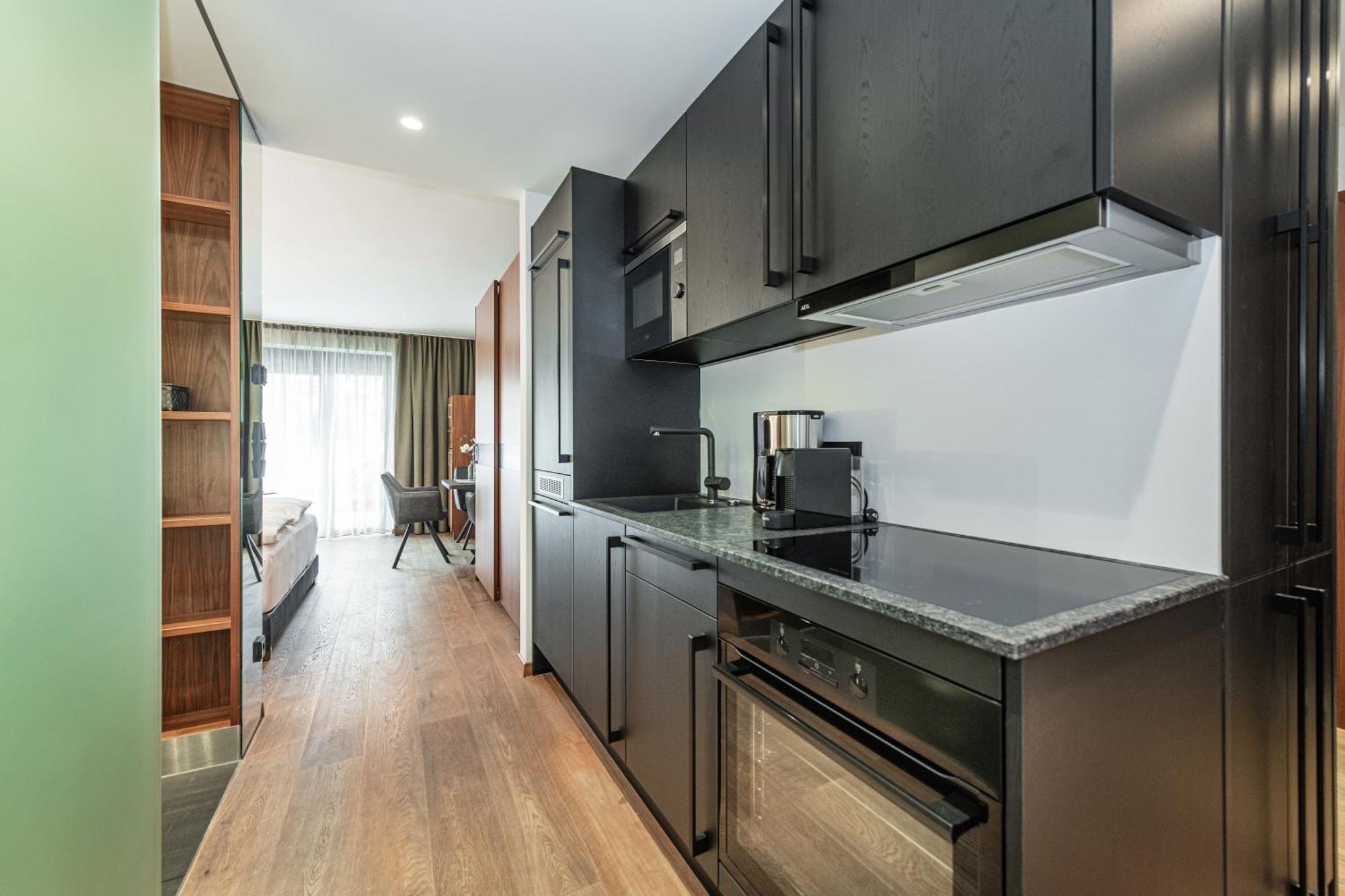 Alpenparks Hotel & Apartment Taxacher Кирхберг Экстерьер фото