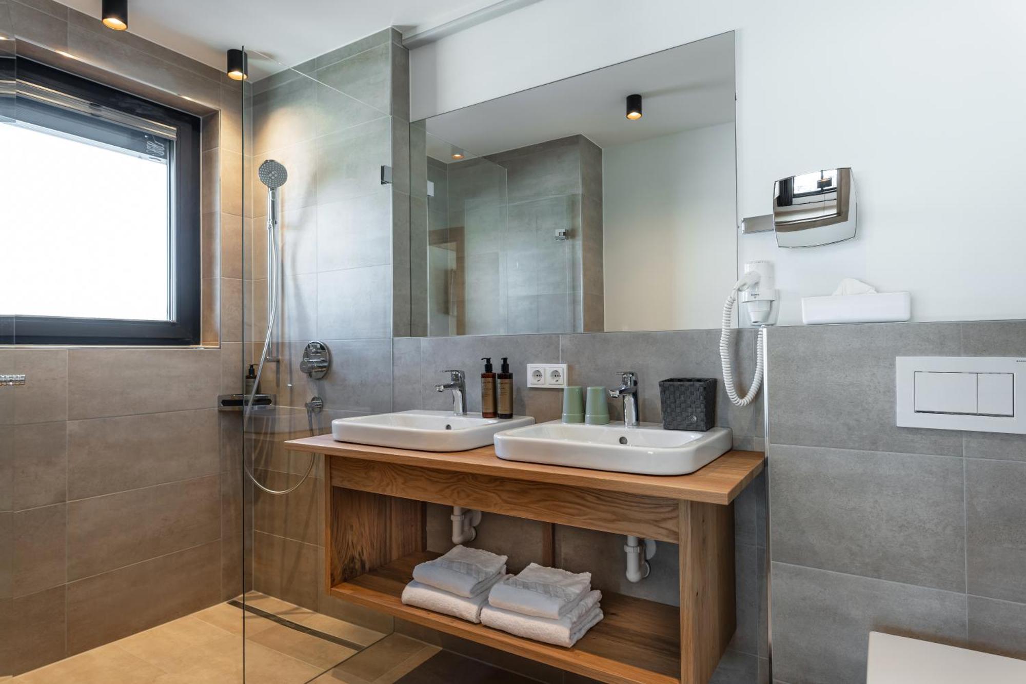 Alpenparks Hotel & Apartment Taxacher Кирхберг Номер фото