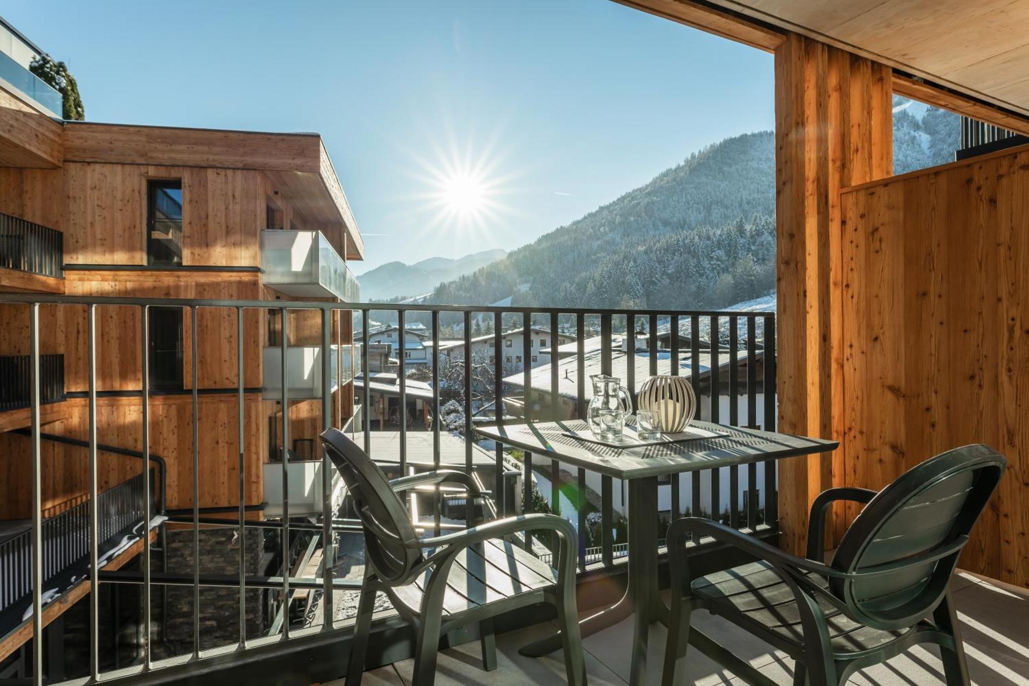 Alpenparks Hotel & Apartment Taxacher Кирхберг Экстерьер фото