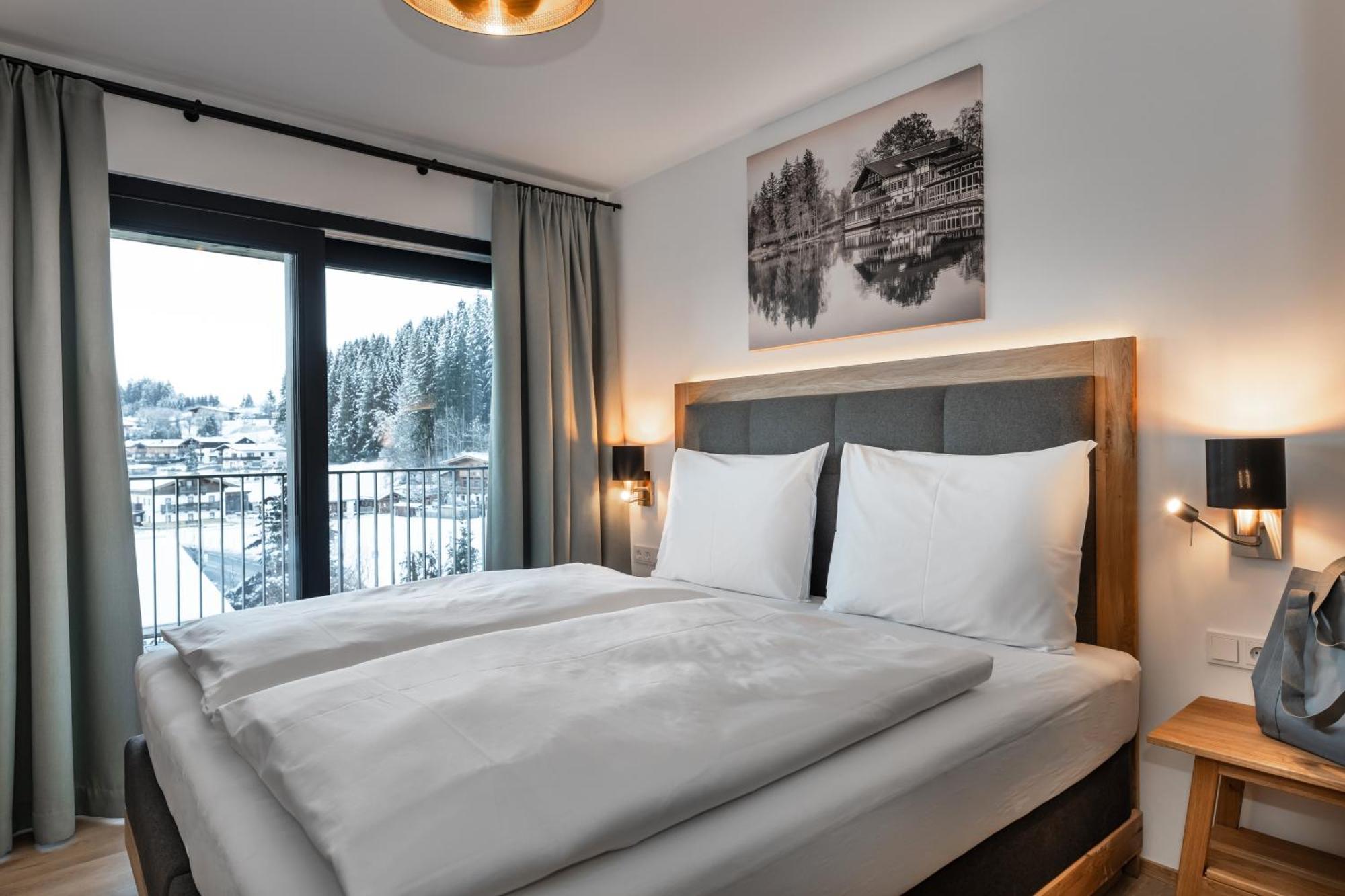 Alpenparks Hotel & Apartment Taxacher Кирхберг Номер фото