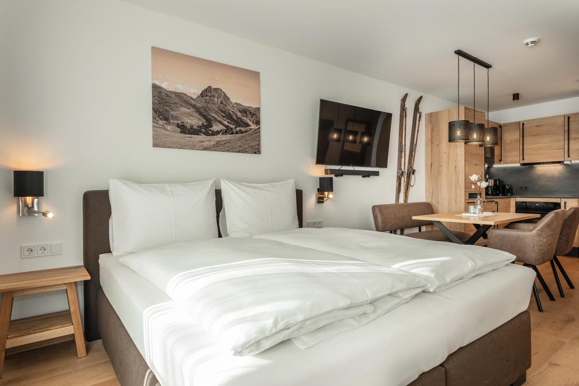 Alpenparks Hotel & Apartment Taxacher Кирхберг Номер фото