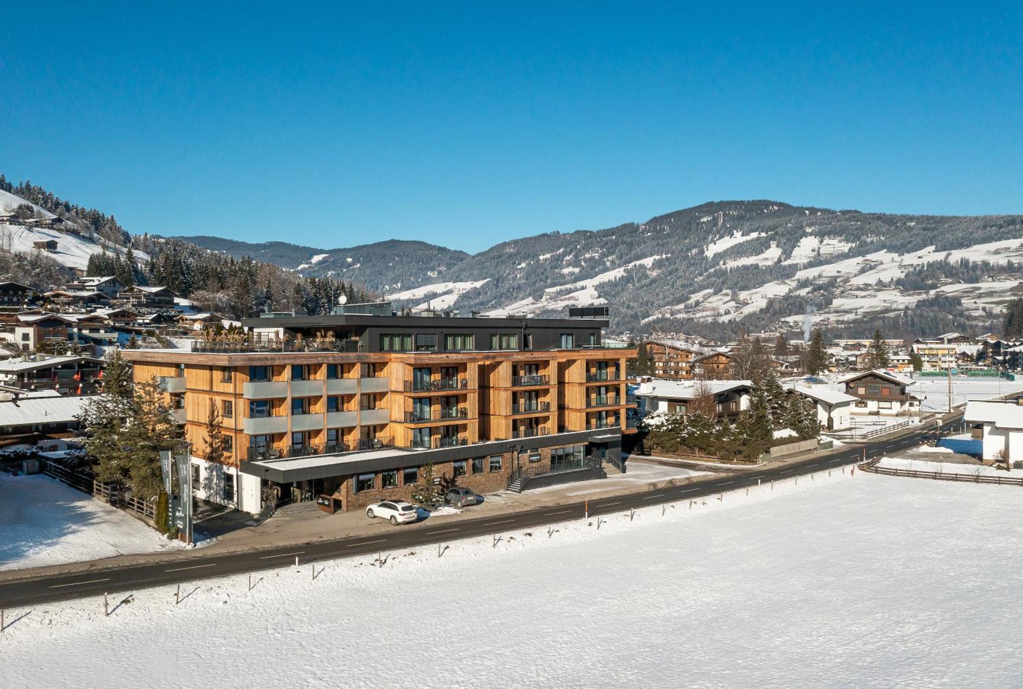 Alpenparks Hotel & Apartment Taxacher Кирхберг Экстерьер фото