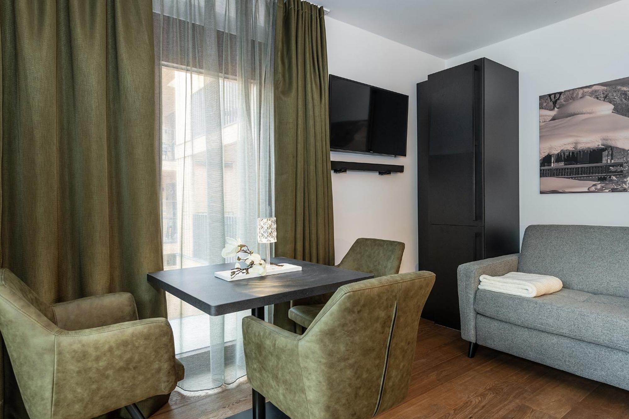 Alpenparks Hotel & Apartment Taxacher Кирхберг Экстерьер фото
