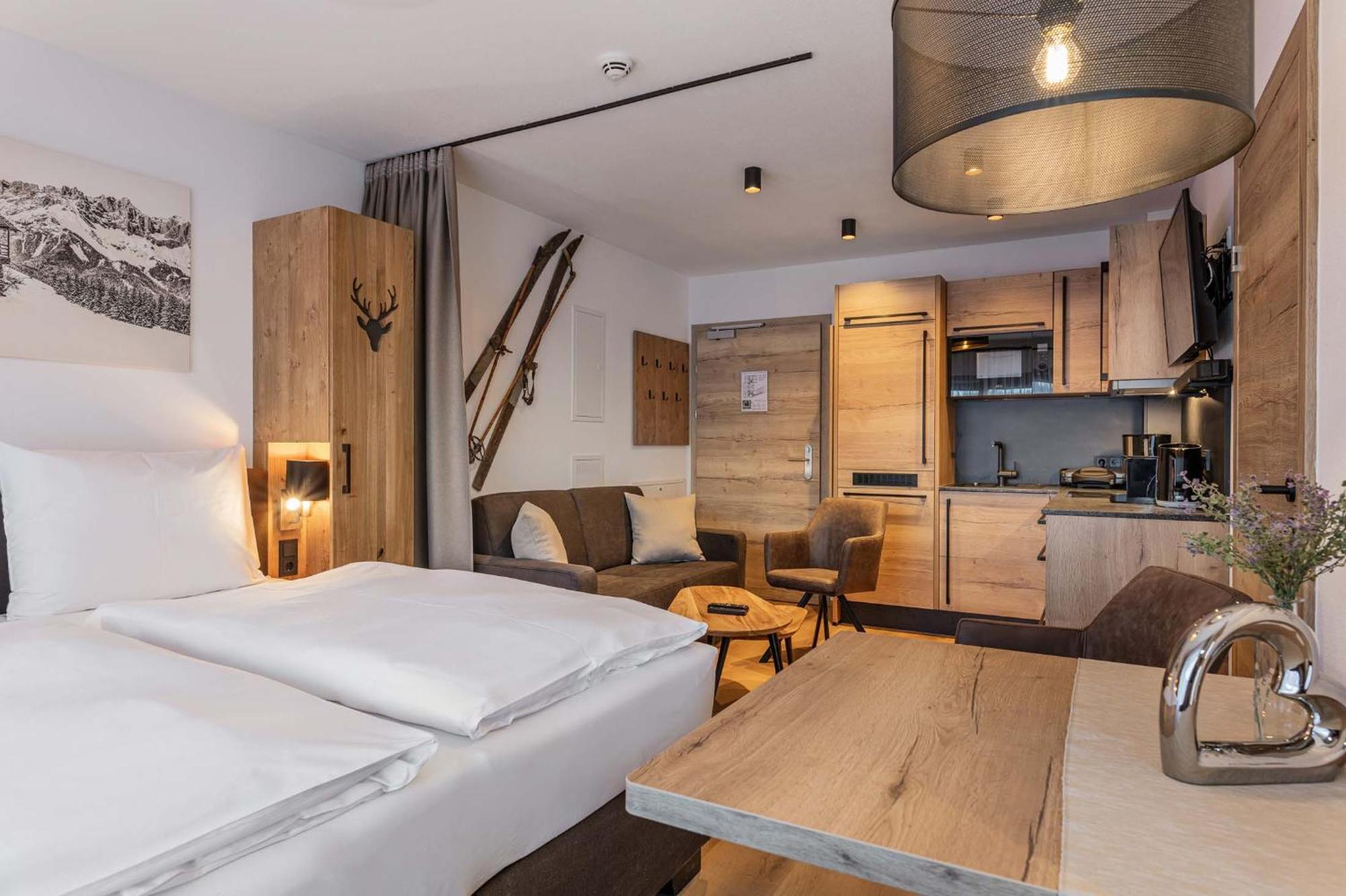 Alpenparks Hotel & Apartment Taxacher Кирхберг Экстерьер фото